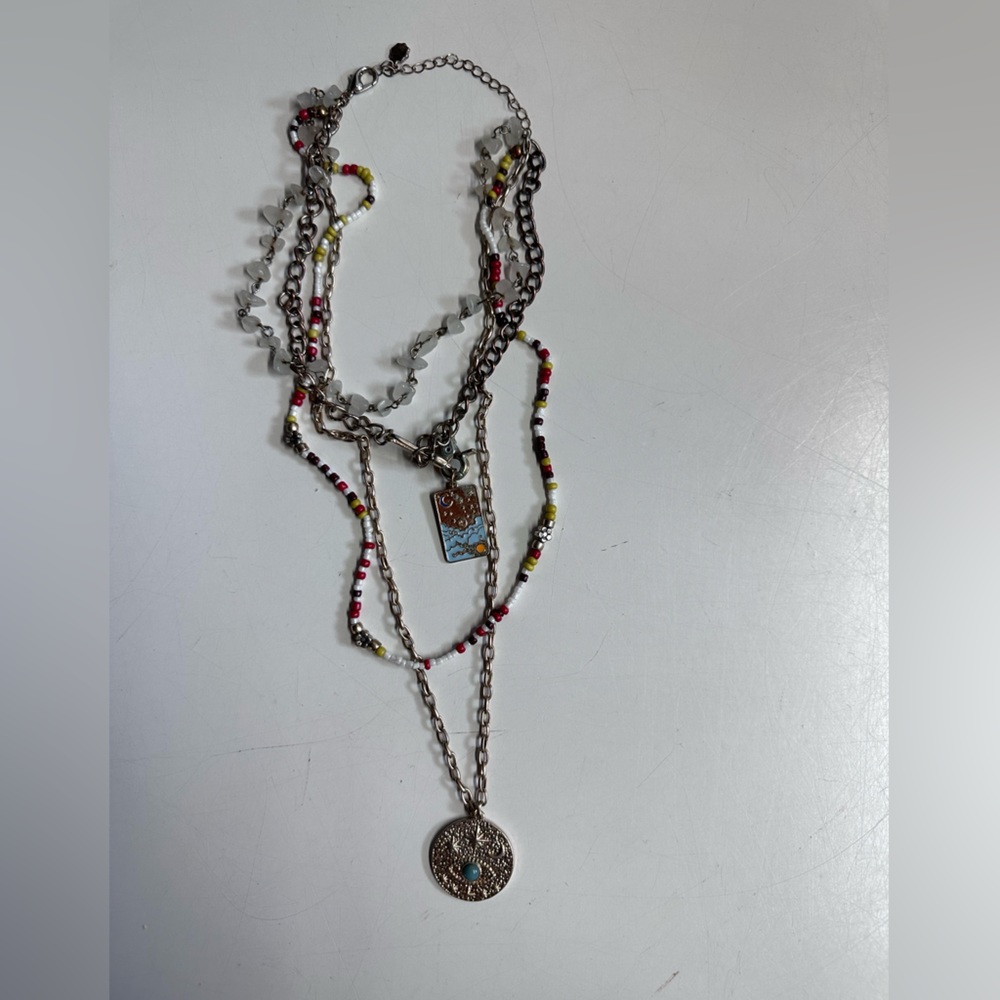 Little Island Necklace from Free People, brass jade